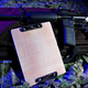 Illustration for article titled The Bulletproof Clipboard: For When Secret Santa Goes Very, Very Wrong